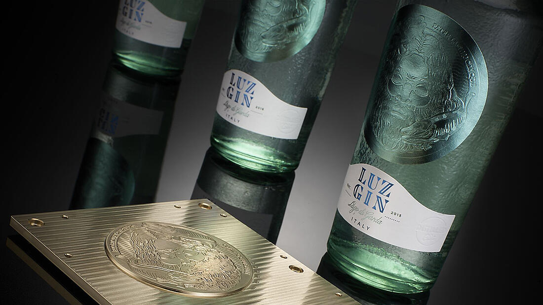 Stamp and bottles with hot-stamped labels from LUXORO