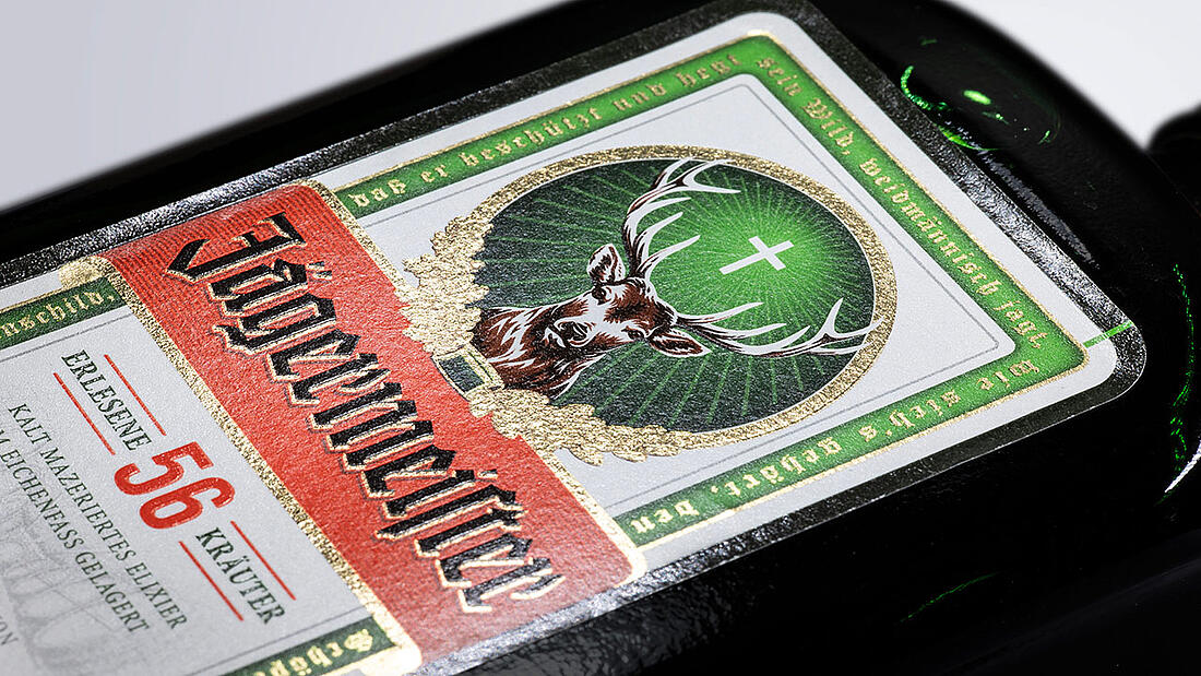 Detail of a Jägermeister label with gold label finishing