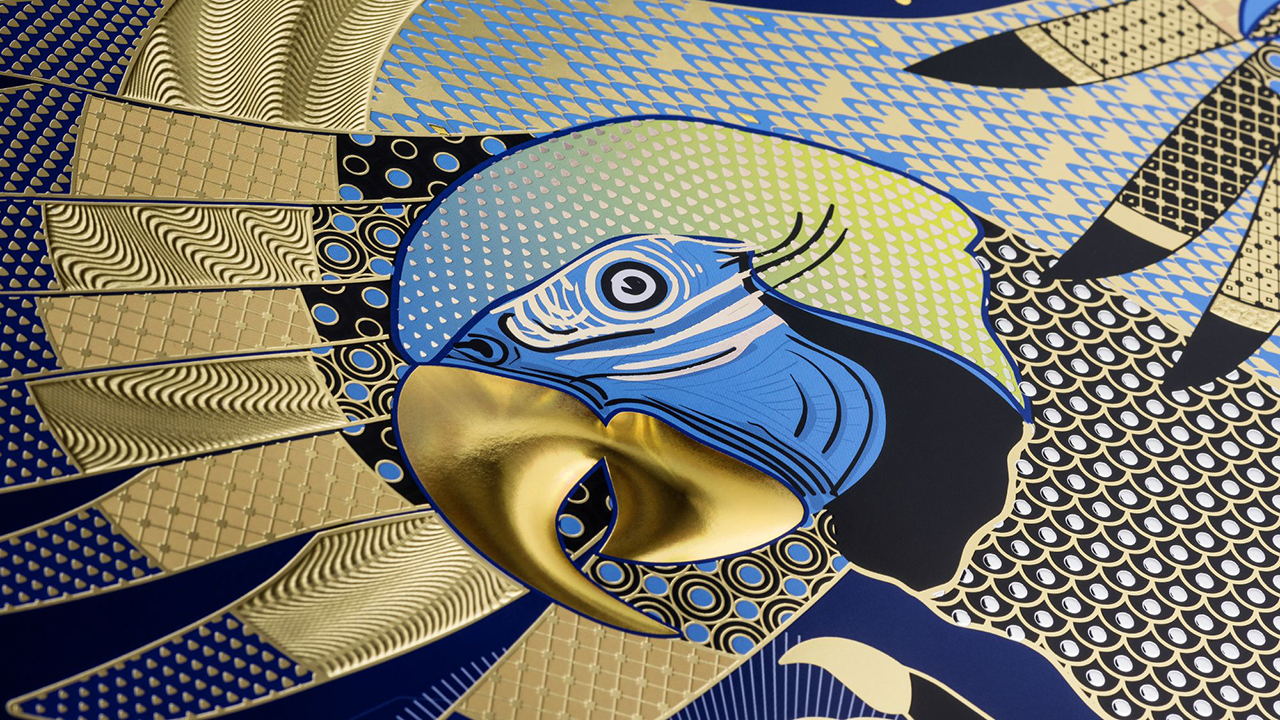 Poster detail with hot-stamped parrot head and wings, enhanced by 3D effects
