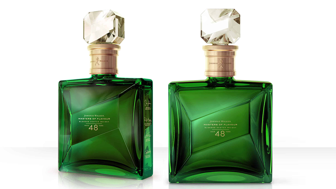 Two green bottles with gold finished plastic label