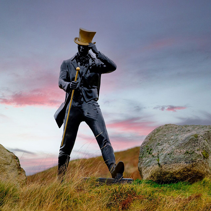 Black statue of the Johnnie Walker icon